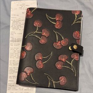 Coach Cherry print notebook brand new. Sold out everywhere. Limited edition.